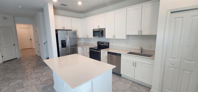 7692 Stone Crk Trl in Kissimmee, FL - Building Photo - Building Photo