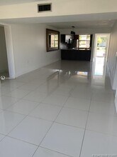 1703 Whitehall Dr-Unit -203 in Davie, FL - Building Photo - Building Photo