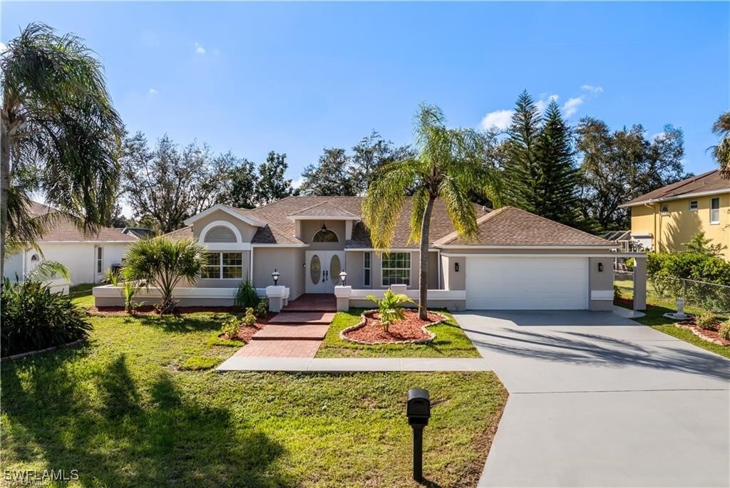 1703 Golfside Village Dr in Lehigh Acres, FL - Building Photo