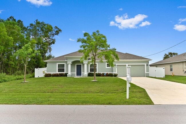 property at 6700 NW Omega Rd