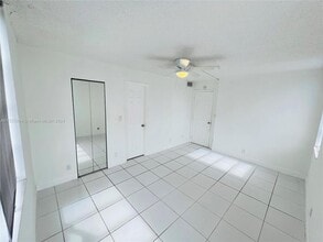 1830 Sabal Palm Dr, Unit 406 in Davie, FL - Building Photo - Building Photo