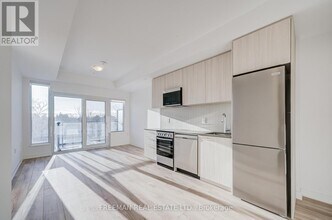 7439 Kingston Rd in Toronto, ON - Building Photo - Building Photo