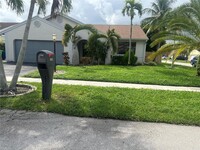 1297 SW 151st Ave in Sunrise, FL - Foto de edificio - Building Photo