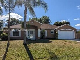 4438 SW Athena Dr in Port St. Lucie, FL - Building Photo