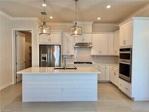 14716 Kingfisher Lp in Naples, FL - Foto de edificio - Building Photo