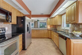 11745 Quail Village Way in Naples, FL - Building Photo - Building Photo