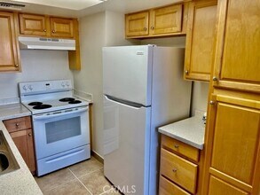 51080 Eisenhower Dr in La Quinta, CA - Building Photo - Building Photo