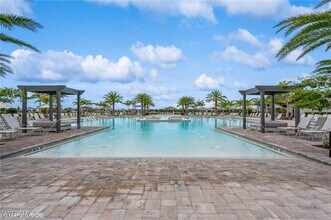 19121 Hinkley Dr in Estero, FL - Building Photo - Building Photo