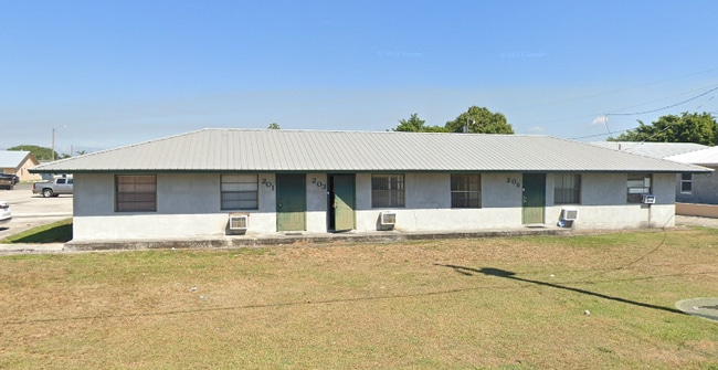 205 NW 15th St, Unit 203 in Belle Glade, FL - Building Photo - Building Photo