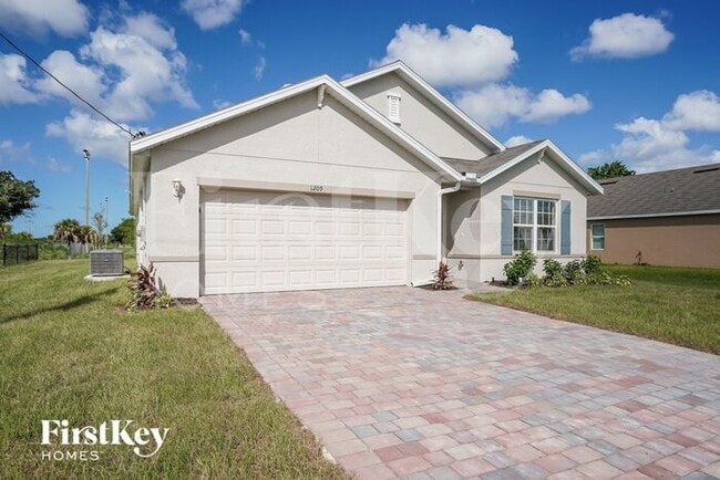 1209 SW 22nd Pl in Cape Coral, FL - Building Photo - Building Photo