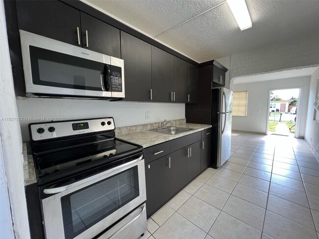 property at 2443 NW 7th St