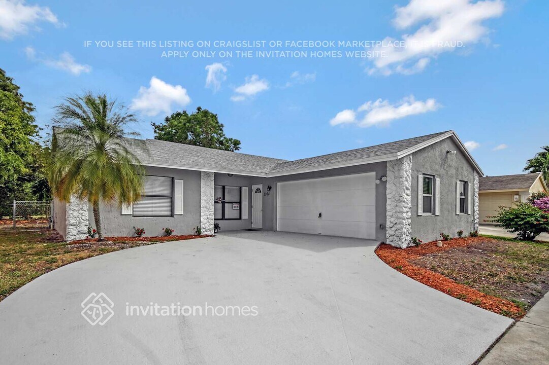 5934 Triphammer Rd in Greenacres, FL - Building Photo