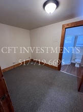 319 N Cochran Ave, Unit 3 in Charlotte, MI - Foto de edificio - Building Photo