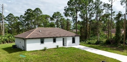 619 Summit Ave S in Lehigh Acres, FL - Building Photo - Building Photo