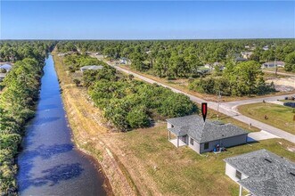 1132 Cummings St E in Lehigh Acres, FL - Building Photo - Building Photo