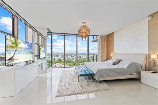 property at 9705 Collins Ave