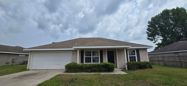 property at 1203 SW Yorktown Glen