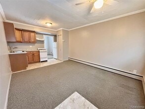 65 N Washington St, Unit 2 in Oxford, MI - Foto de edificio - Building Photo