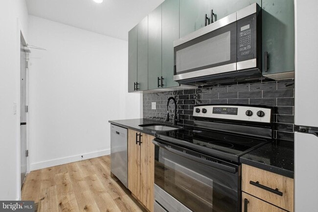 property at 4243 Mantua Ave
