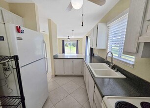 1480 SE Rivergreen Cir in Port St. Lucie, FL - Foto de edificio - Building Photo