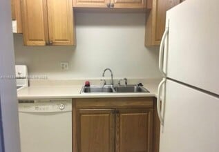 3710 Inverrary Dr, Unit unit #1Q in Lauderhill, FL - Building Photo - Building Photo
