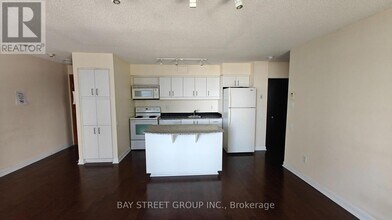 33 Sheppard Ave E in Toronto, ON - Building Photo - Building Photo