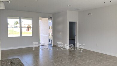 48 Orchid Ln in Poinciana, FL - Building Photo - Building Photo