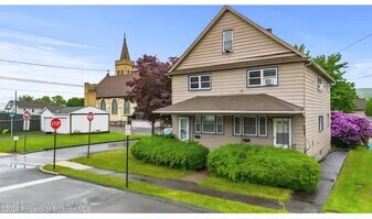 215 Bellman St in Throop, PA - Building Photo