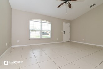 10612 Cedar Forest Cir-Unit -D204 in Clermont, FL - Building Photo - Building Photo