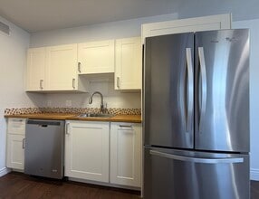 3121 S Tamarac Dr, Unit J306 in Denver, CO - Foto de edificio - Building Photo