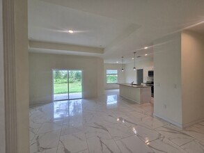 1218 Ecstasy St E in Lehigh Acres, FL - Building Photo - Building Photo
