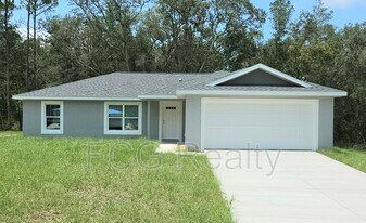 10057 N Athenia Dr in Citrus Springs, FL - Building Photo