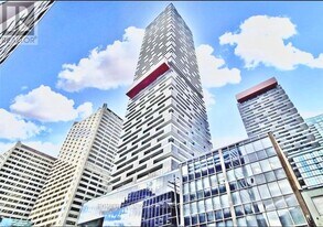 8 Eglinton Ave E in Toronto, ON - Building Photo