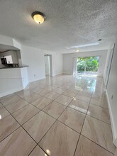 5065 Wiles Rd in Coconut Creek, FL - Building Photo - Building Photo