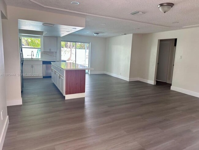 property at 6777 NW 4th St