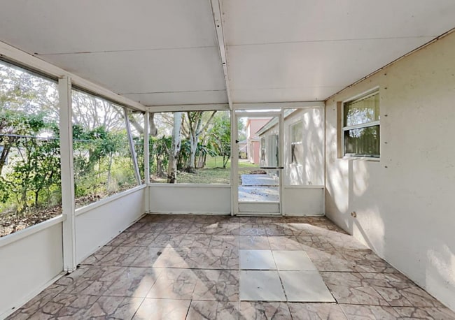 property at 10660 SW 21st St