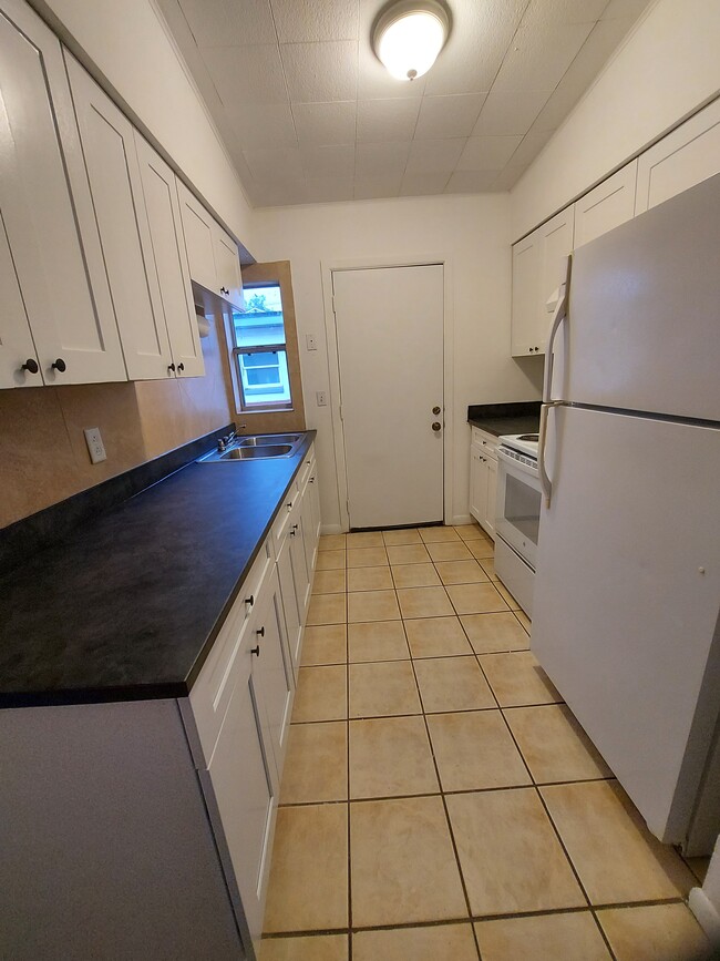 2115 S Mills Ave, Unit Driveway Side