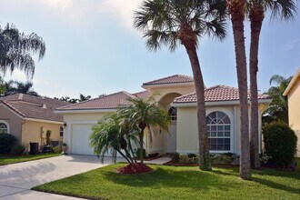 6042 Newport Village Way in Greenacres, FL - Building Photo - Building Photo