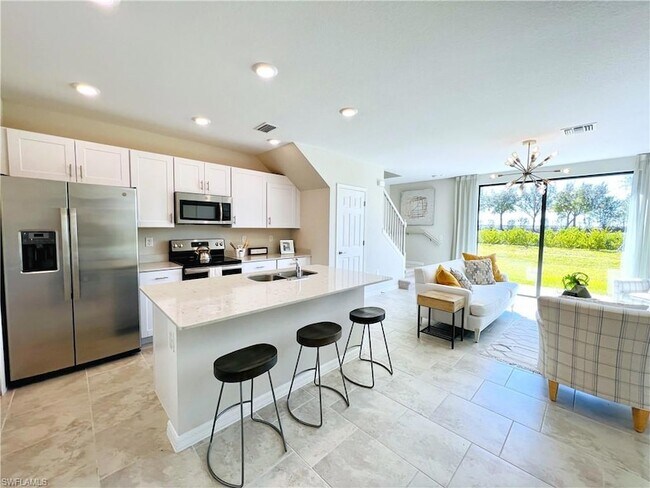14297 Oviedo Pl in Tice, FL - Building Photo - Building Photo