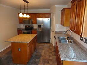105 Oak Knoll Dr in Whitsett, NC - Building Photo - Building Photo