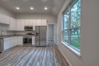 9599 Darkwood St in Willis, TX - Building Photo - Building Photo