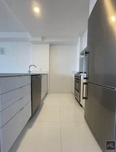 Rent stabilized 1 bedroom spanning 725 sq in Queens, NY - Building Photo - Building Photo