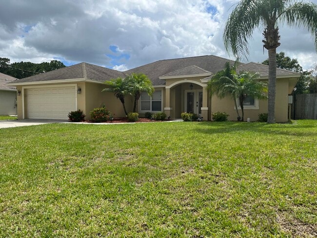 property at 3718 SW Masilunas St