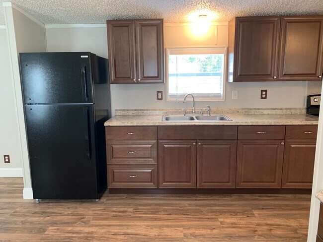 154 NW Alpata Ct, Unit 8 in Lake City, FL - Foto de edificio - Building Photo