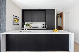 32 E 1st St in New York, NY - Building Photo - Building Photo