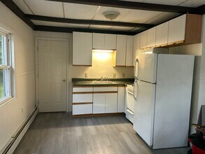 959 Whittier Hwy, Unit Winnipesaukee Commons Unit #4 in Moultonborough, NH - Building Photo - Building Photo