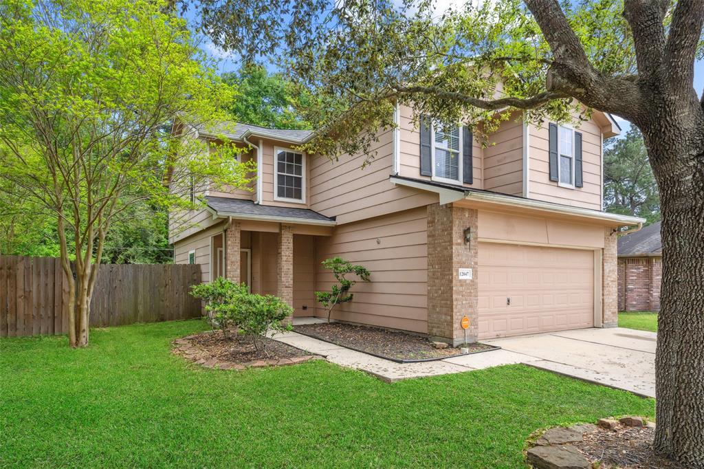 12047 Belle Ct in Pinehurst, TX - Building Photo