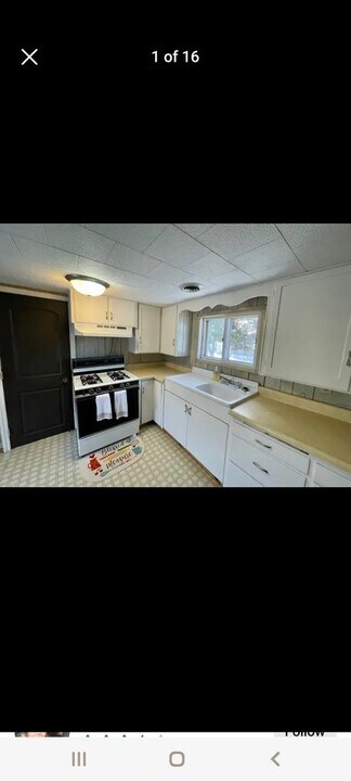 301 E 5th St-Unit -1/2 in Merrill, WI - Building Photo