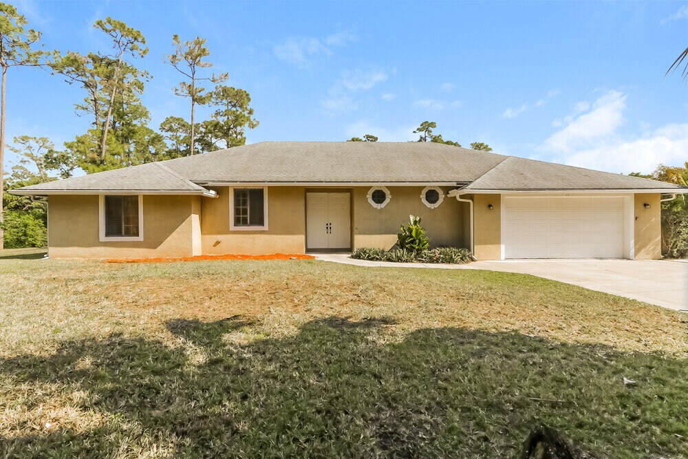 15731 85th Rd N in Westlake, FL - Building Photo