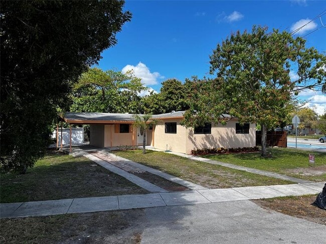 property at 285 NE 43rd St